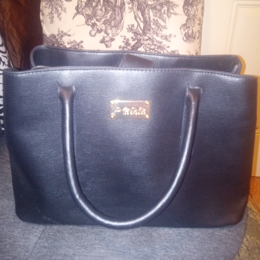 Gently used Bebe black handbag